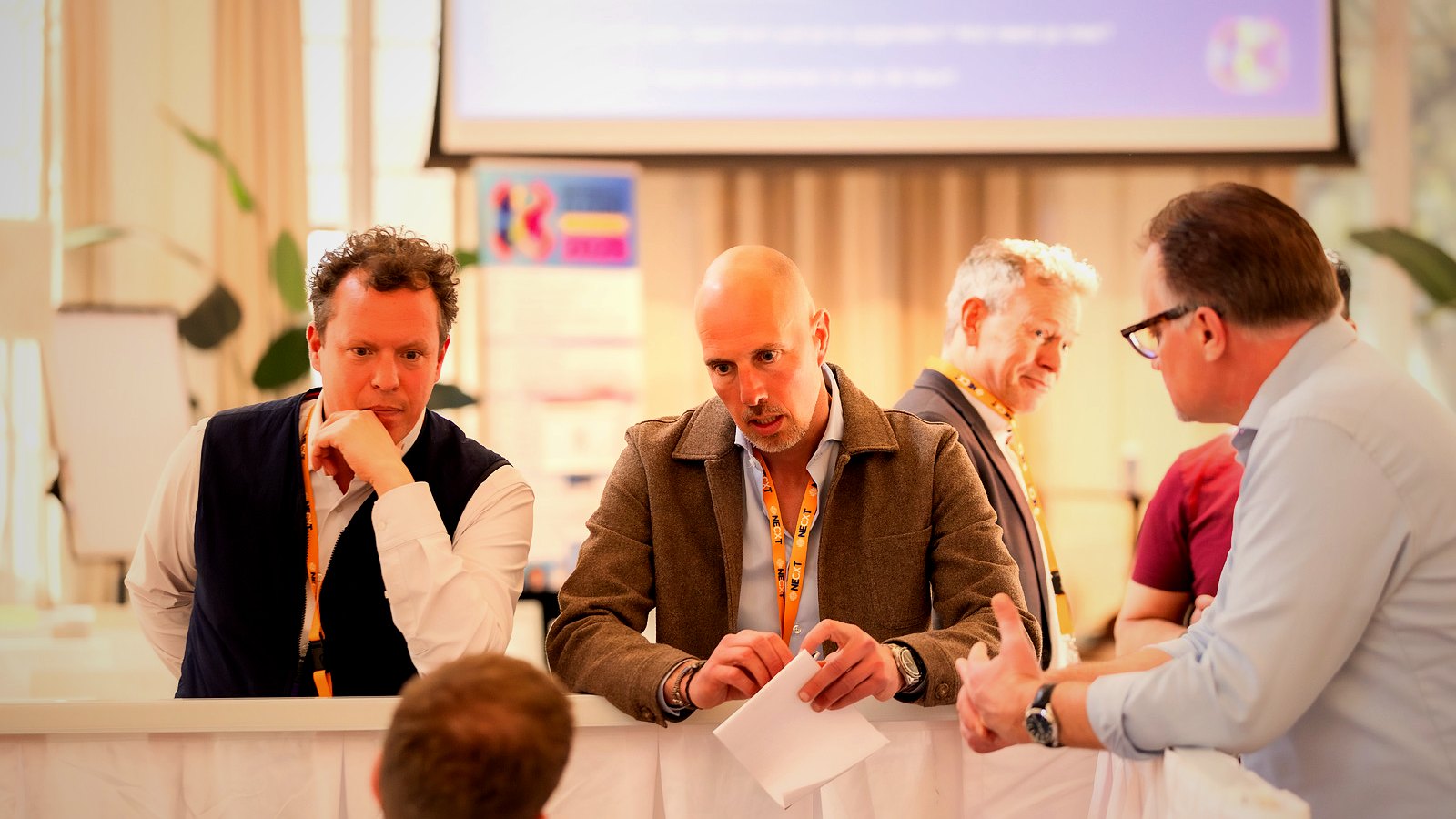 Otto listening intently in a group analysis conversation